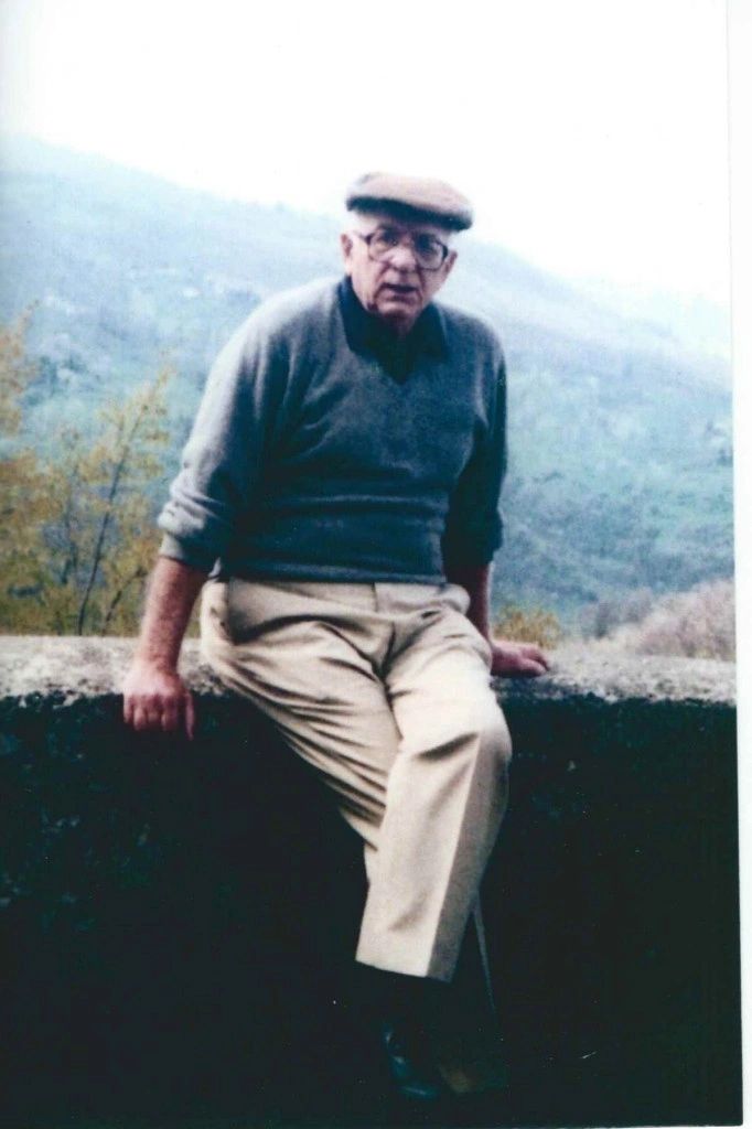 Albert Bertozzi seated outdoors