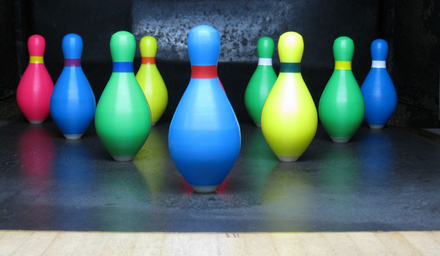 Colorful bowling pins made by American Products Inc.
